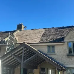 Before and after image of roof cleaning